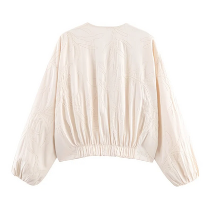 Veste matelassée bleu marine à motifs brodés – Style oversize chic